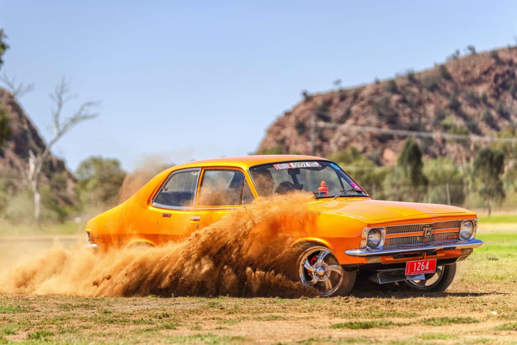 Orange car doing skid